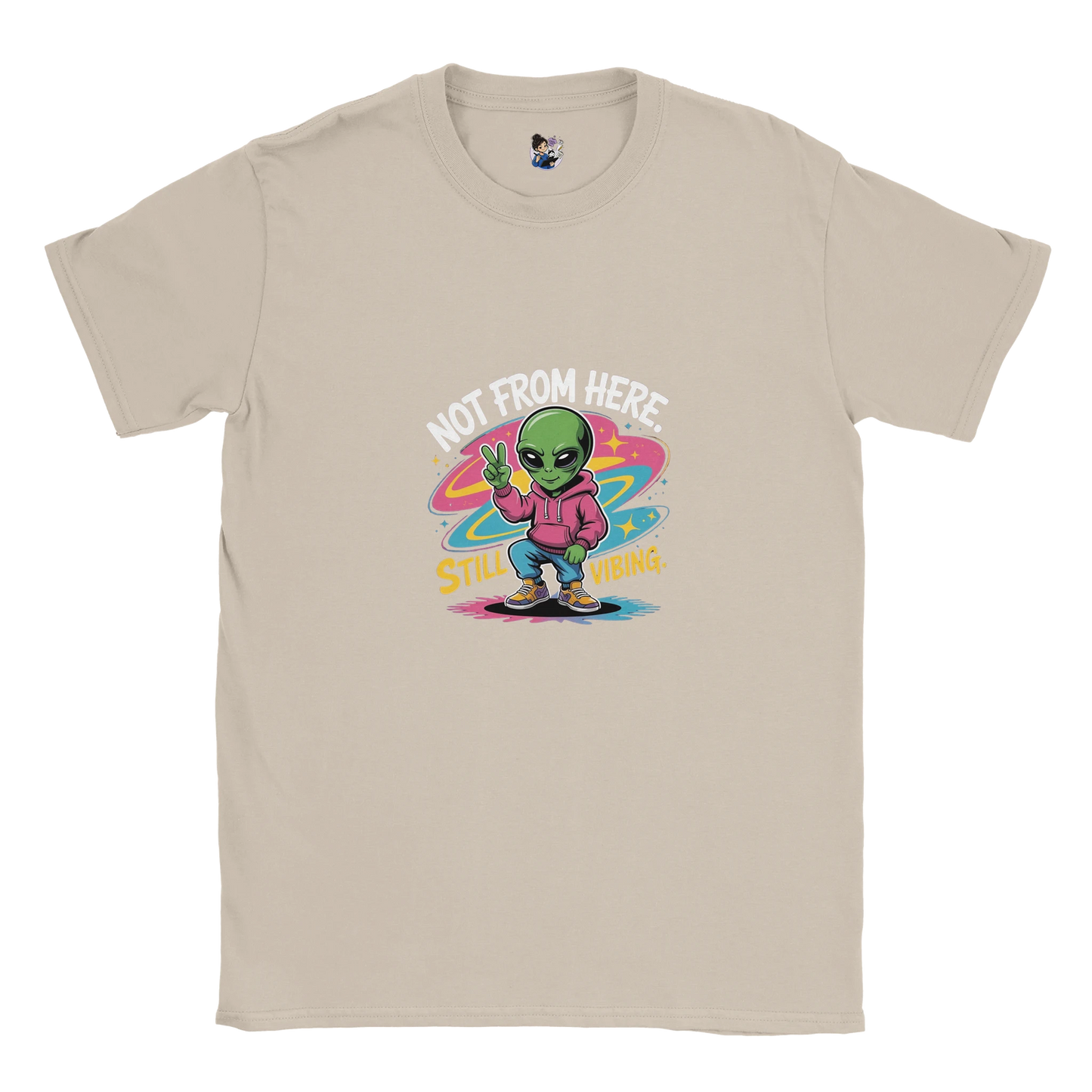 Not From Here Still Vibing graphic tee featuring an alien-themed design on a casual everyday t-shirt.