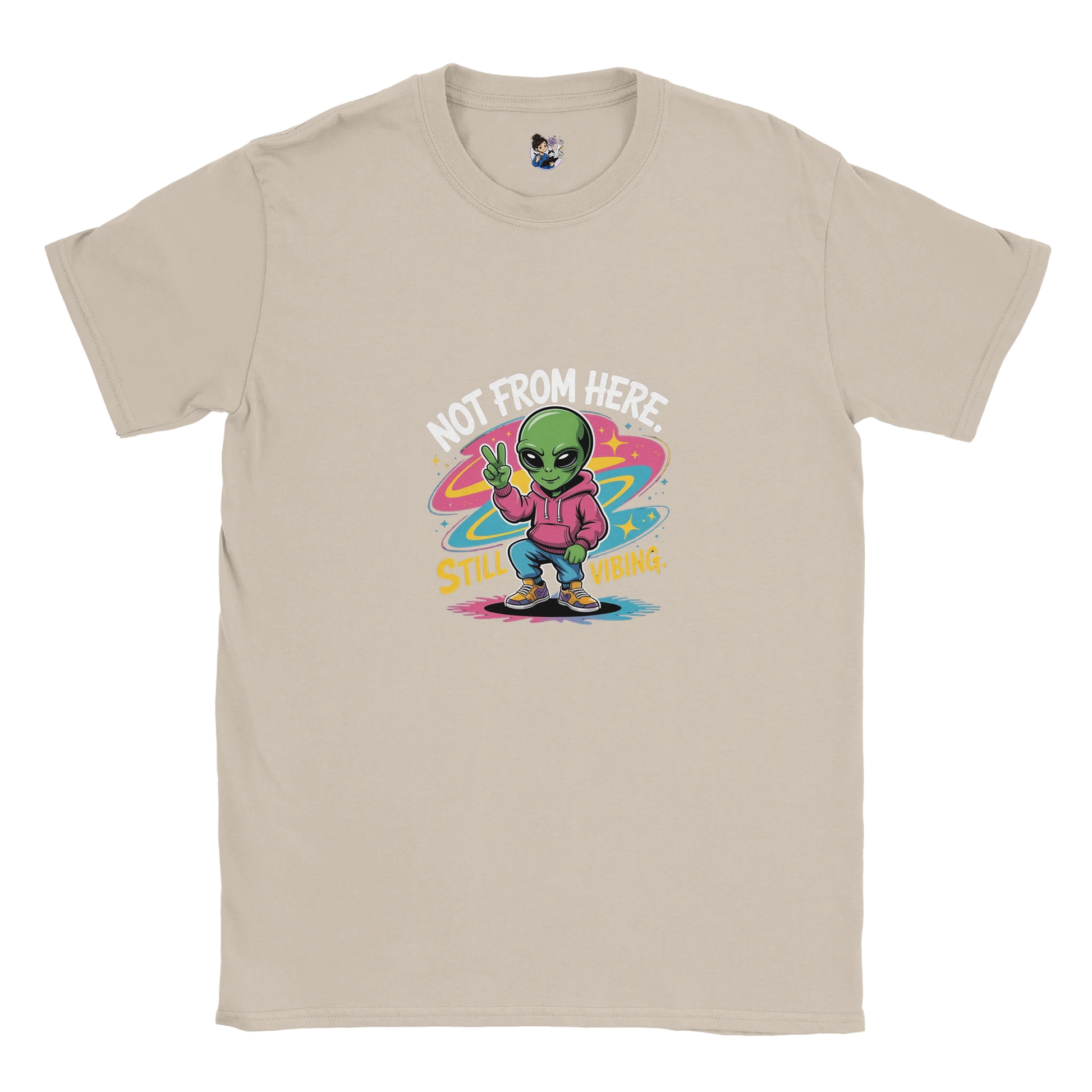 Not From Here Still Vibing graphic tee featuring an alien-themed design on a casual everyday t-shirt.