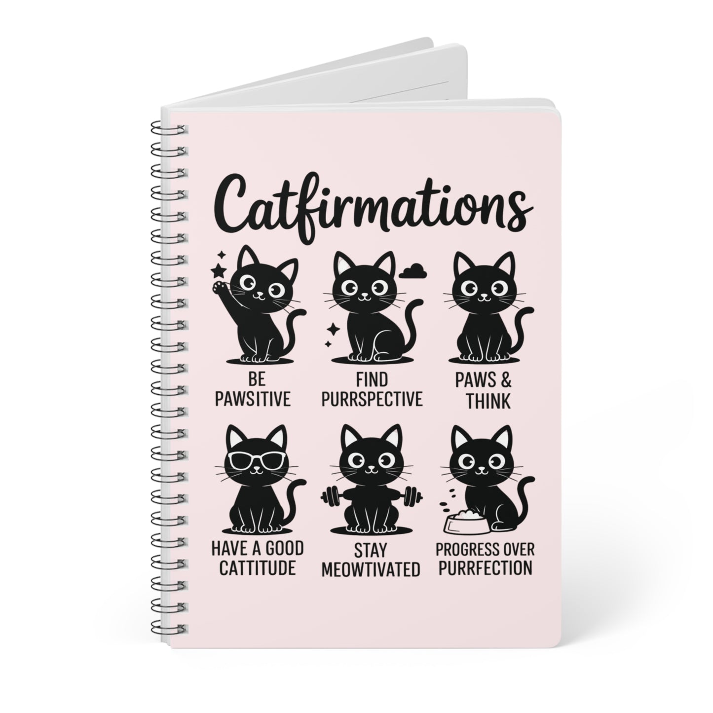 Notebook with cat-themed sayings on a pink cover