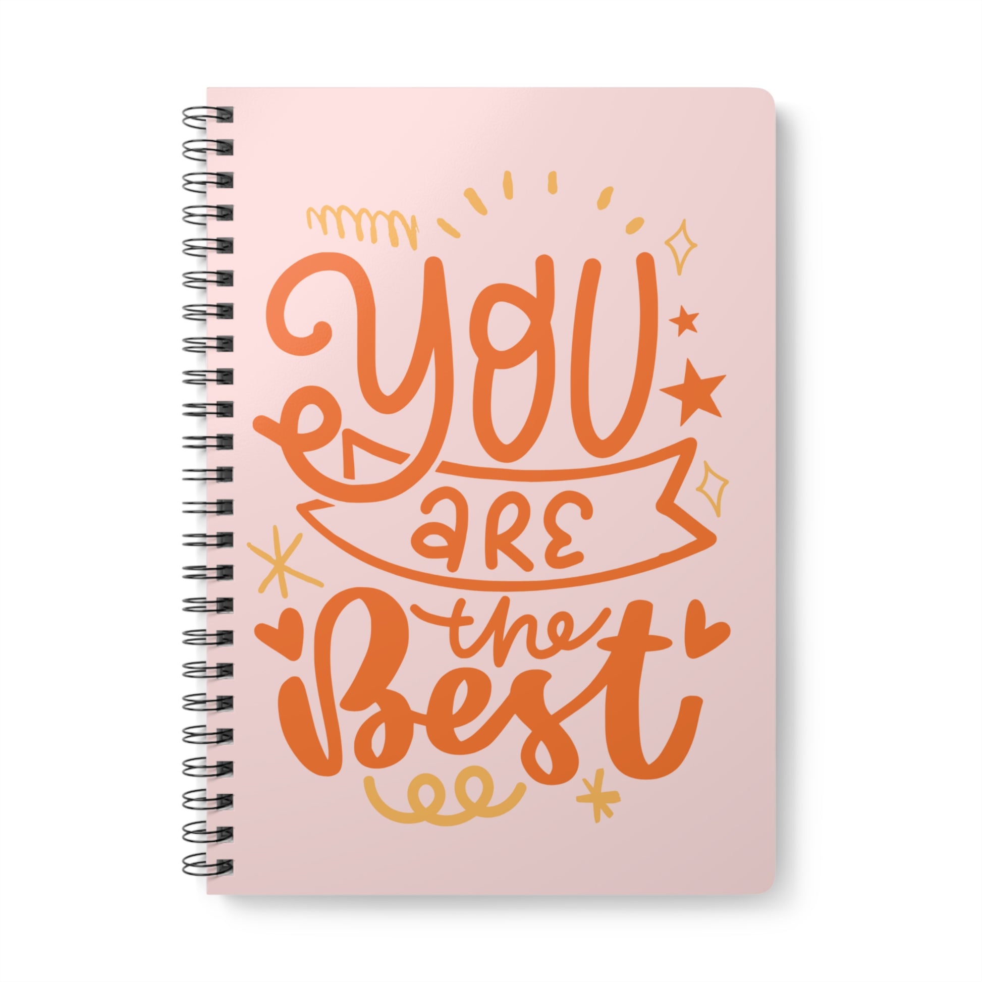 Pink notebook with 'You are the best' text on a white background
