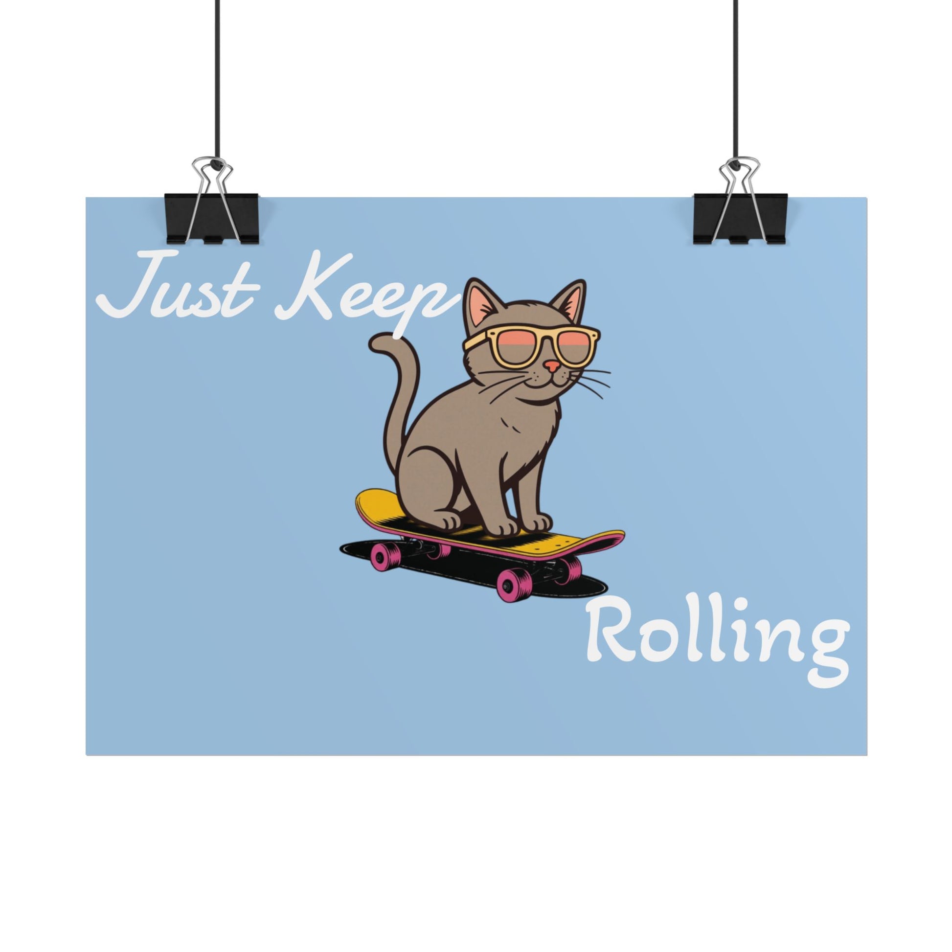 Cartoon cat on a skateboard with sunglasses and text 'Just Keep Rolling' on a light blue background.
