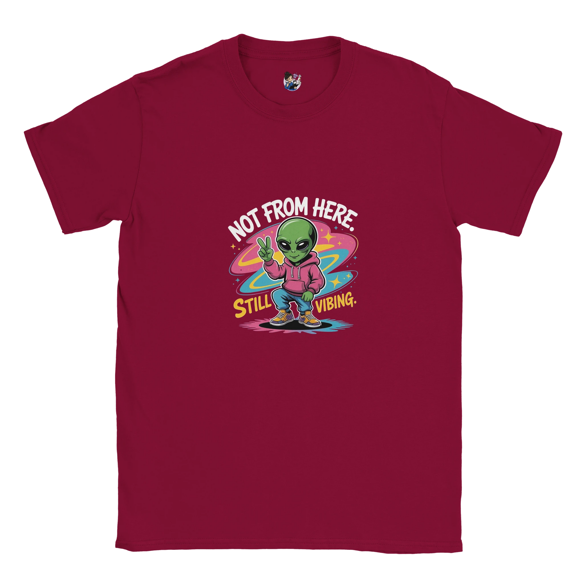 Not From Here Still Vibing graphic tee featuring an alien-themed design on a casual everyday t-shirt.