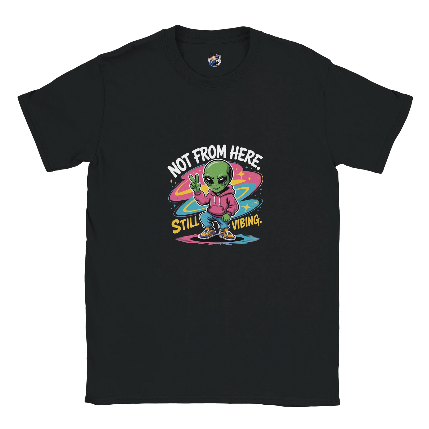 Not From Here Still Vibing graphic tee featuring an alien-themed design on a casual everyday t-shirt.