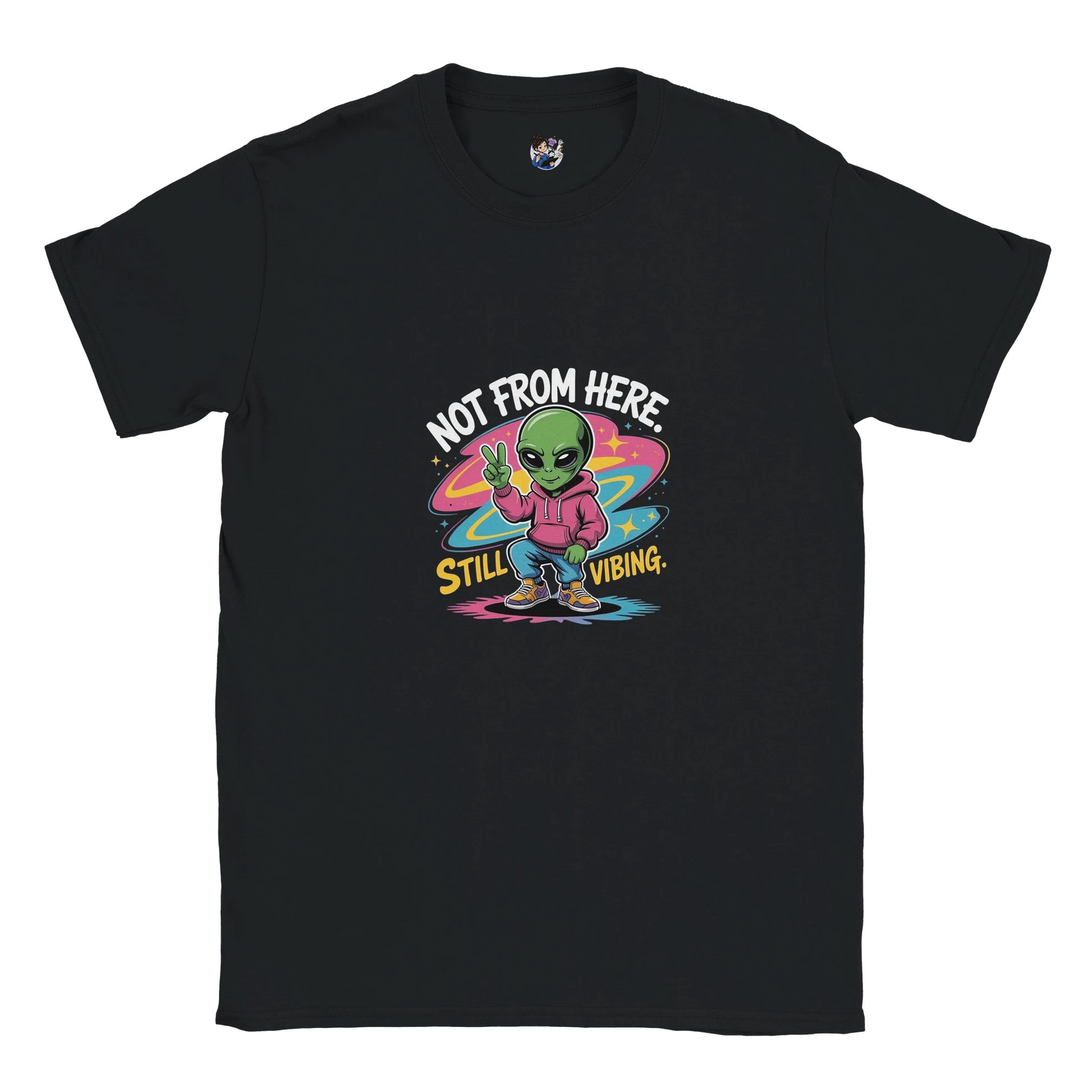 Not From Here Still Vibing graphic tee featuring an alien-themed design on a casual everyday t-shirt.